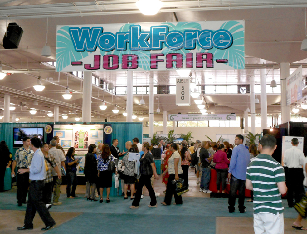 A group of people at a job fair are shown here.