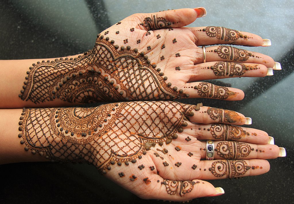 Henna art applied to hands