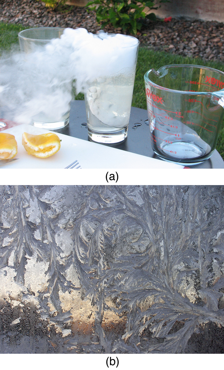 Figure a shows vapors flowing out from the middle of three glasses placed adjacently on a table. This glass contains a piece of dry ice in lemonade. Two squeezed lemon slices are also seen alongside the glasses. Figure b shows frost patterns formed on a window pane.